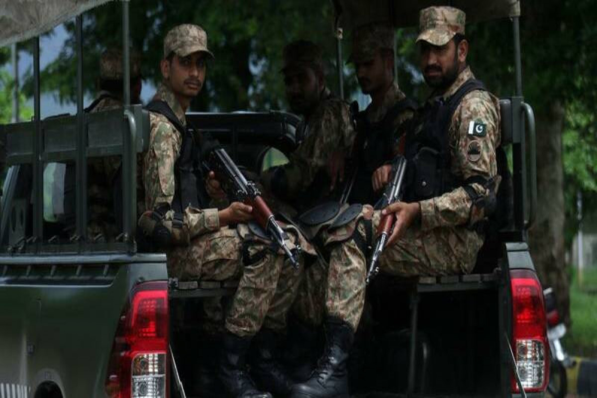 Pakistan says troops kill 33 militants crossing from Afghanistan