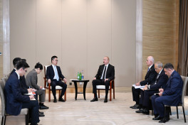 Azerbaijani President meets with founder and chairman of Sichian Sunsync Photovoltaic Technology Co