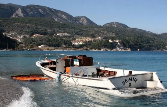 Eighteen die after migrant boat sinks off southern Greek island