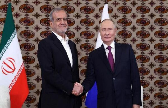 Iranian President Masoud Pezeshkian and Vladimir Putin, Russian President