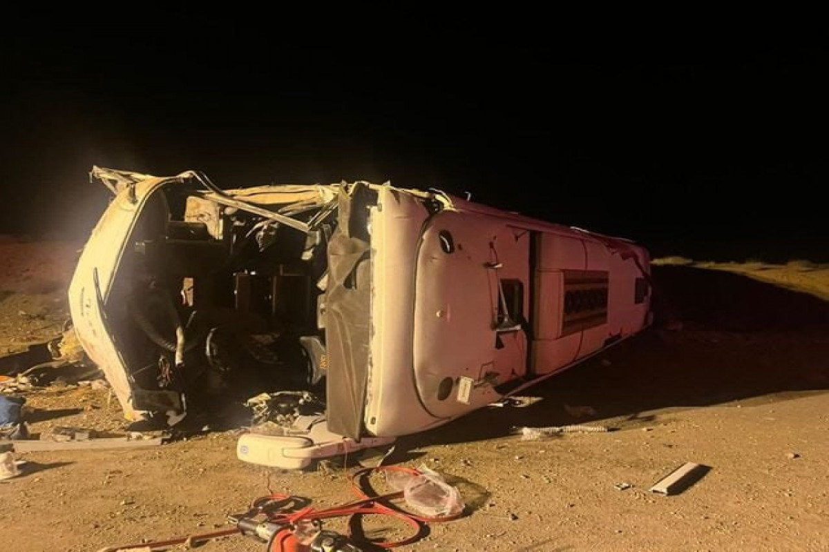 Bus overturned after colliding with a passenger car in Iran, killing 13 people