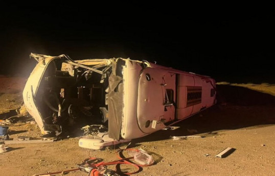 Bus overturned after colliding with a passenger car in Iran, killing 13 people