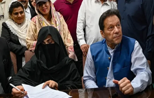 Former Prime Minister Imran Khan and his wife Bushra Bibi