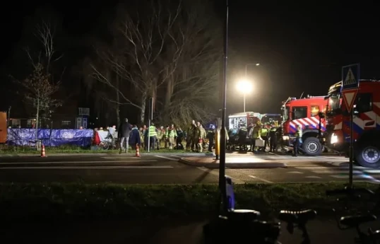 Car hits people waiting to watch parade in Dutch town, injuring 9