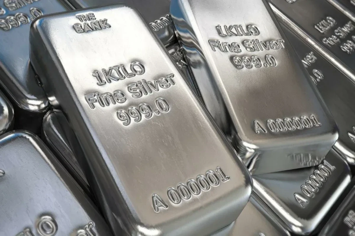 Silver tops $75 as gold and platinum surge to records