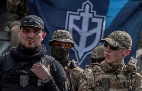 Denis Kapustin, leader of the "Russian Volunteer Corps" (left)