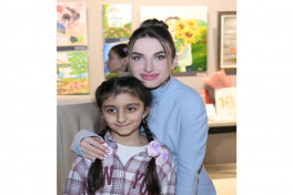 Arzu Aliyeva and Alena Aliyeva attend “10 Years Lived in Colors” exhibition