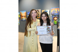 Arzu Aliyeva and Alena Aliyeva attend “10 Years Lived in Colors” exhibition