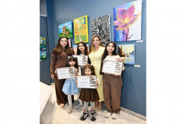 Arzu Aliyeva and Alena Aliyeva attend “10 Years Lived in Colors” exhibition