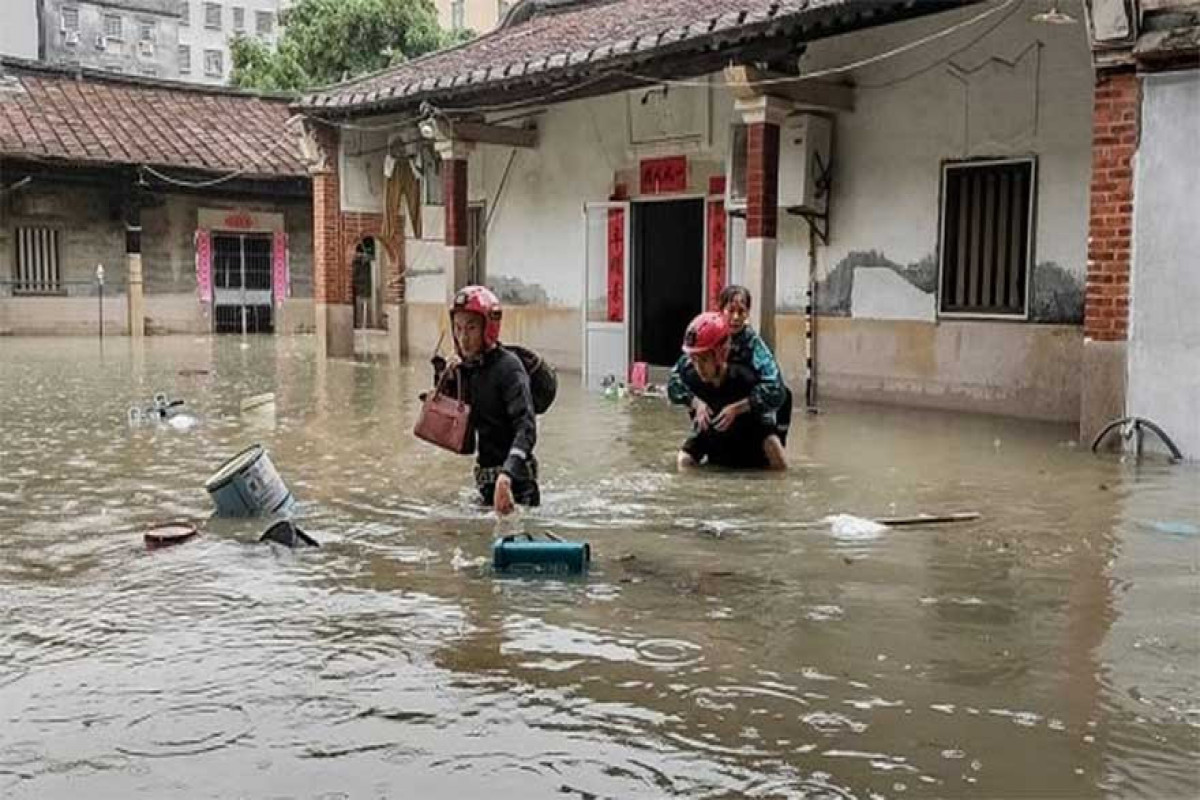 Two dead, 10 missing after colossal rain in China