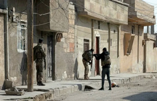 Syrian forces wage deadly clashes with Assad loyalists