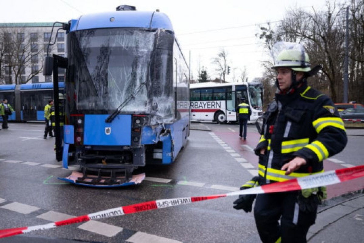 Collision between German school bus, tram hurts 11
