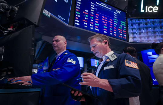 U.S. stocks close lower over tariff uncertainty, slowing economy