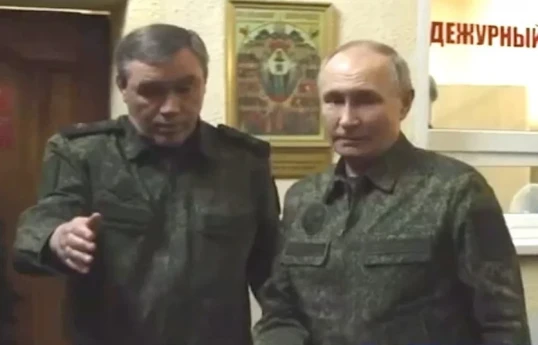 Kremlin clarifies Putin’s appearance in military attire
