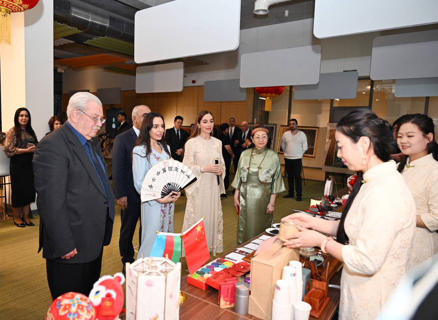 Leyla Aliyeva and Arzu Aliyeva meet with students receiving distance Chinese language education at UNEC