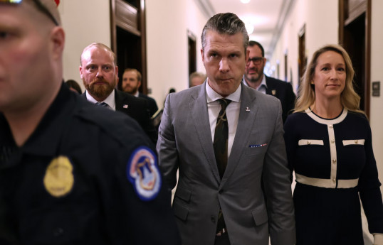Media: U.S. defense secretary's wife attended meetings with foreign defense officials
