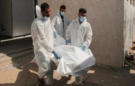 Bodies of 15 Palestinians arrive at Gaza hospital from Israel