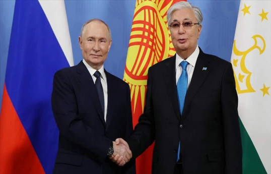 Vladimir Putin, President of the Russian Federation and  Kazakh President Kassym-Jomart Tokayev