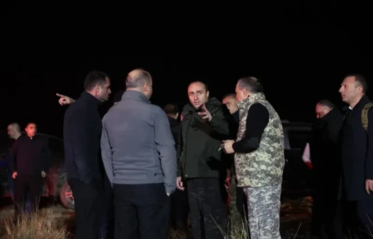 Georgian Minister of Internal Affairs Geka Geladze visits the site of the Turkish military helicopter crash