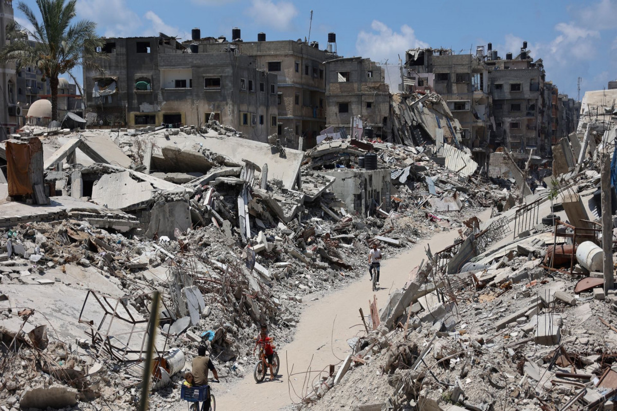 Israel receives remains of hostage held in Gaza as Cairo hosts follow-up talks