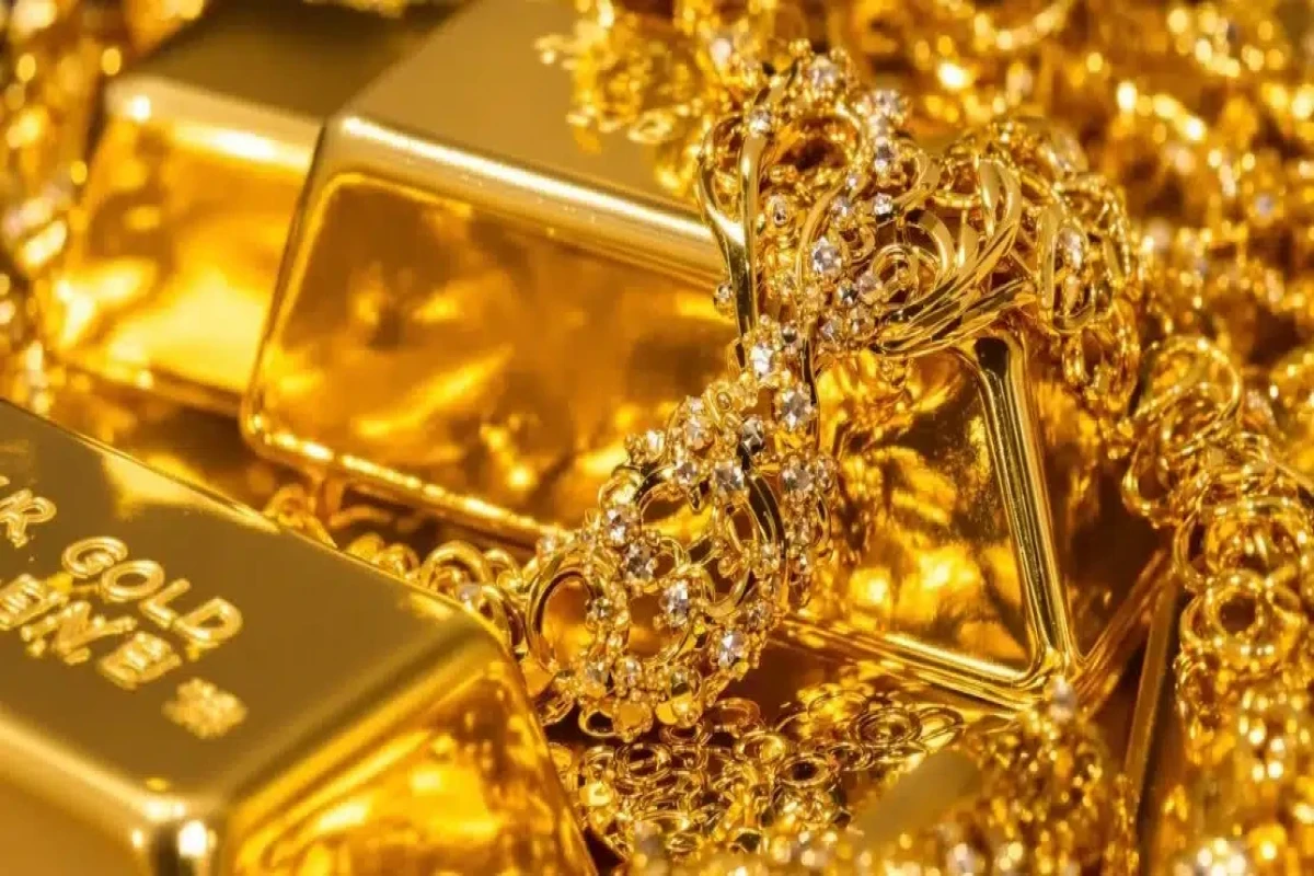 Gold eases from near two-week high as investors book profits
