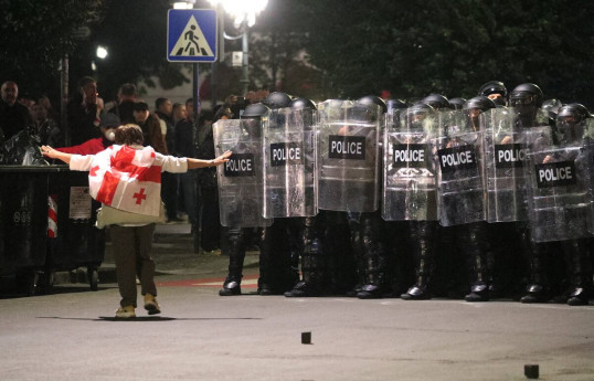 Georgian police use water cannon to repel protesters from presidential palace