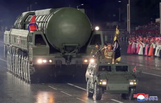 North Korea holds military parade, shows off new intercontinental missile