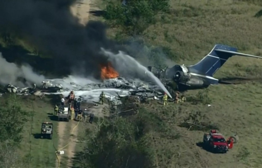 Plane crash northwest of Fort Worth, multiple semi-trucks on fire
