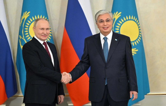 Russian President Vladimir Putin, and President of the Republic of Kazakhstan Kassym-Jomart Tokayev