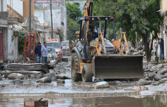 Death toll from torrential rains in Mexico rises to 64 as search operations expand