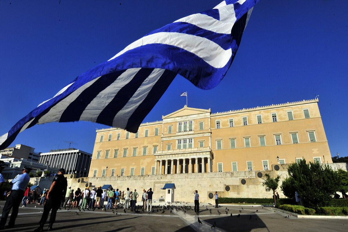 Greece adopts law extending working hours despite protests