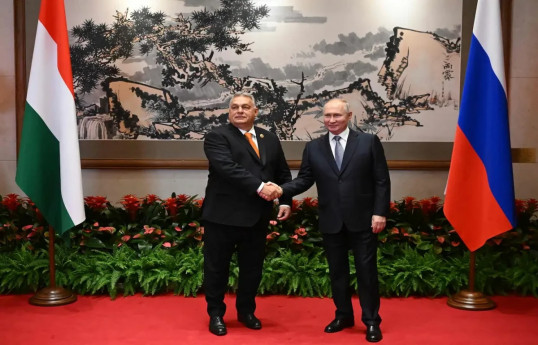 Hungarian Prime Minister Viktor Orban, and Russian President Vladimir Putin