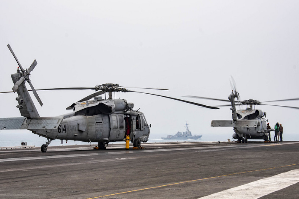 US Navy helicopter and fighter jet crash in separate incidents in the South China Sea