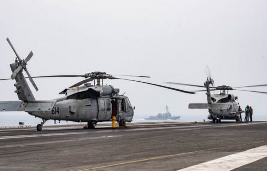 US Navy helicopter and fighter jet crash in separate incidents in the South China Sea