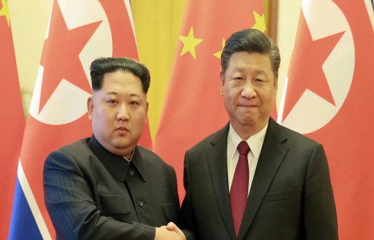 Xi Jinping holds talks with Kim Jong Un