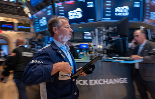 Kicking off a data-heavy week, U.S. stocks close higher