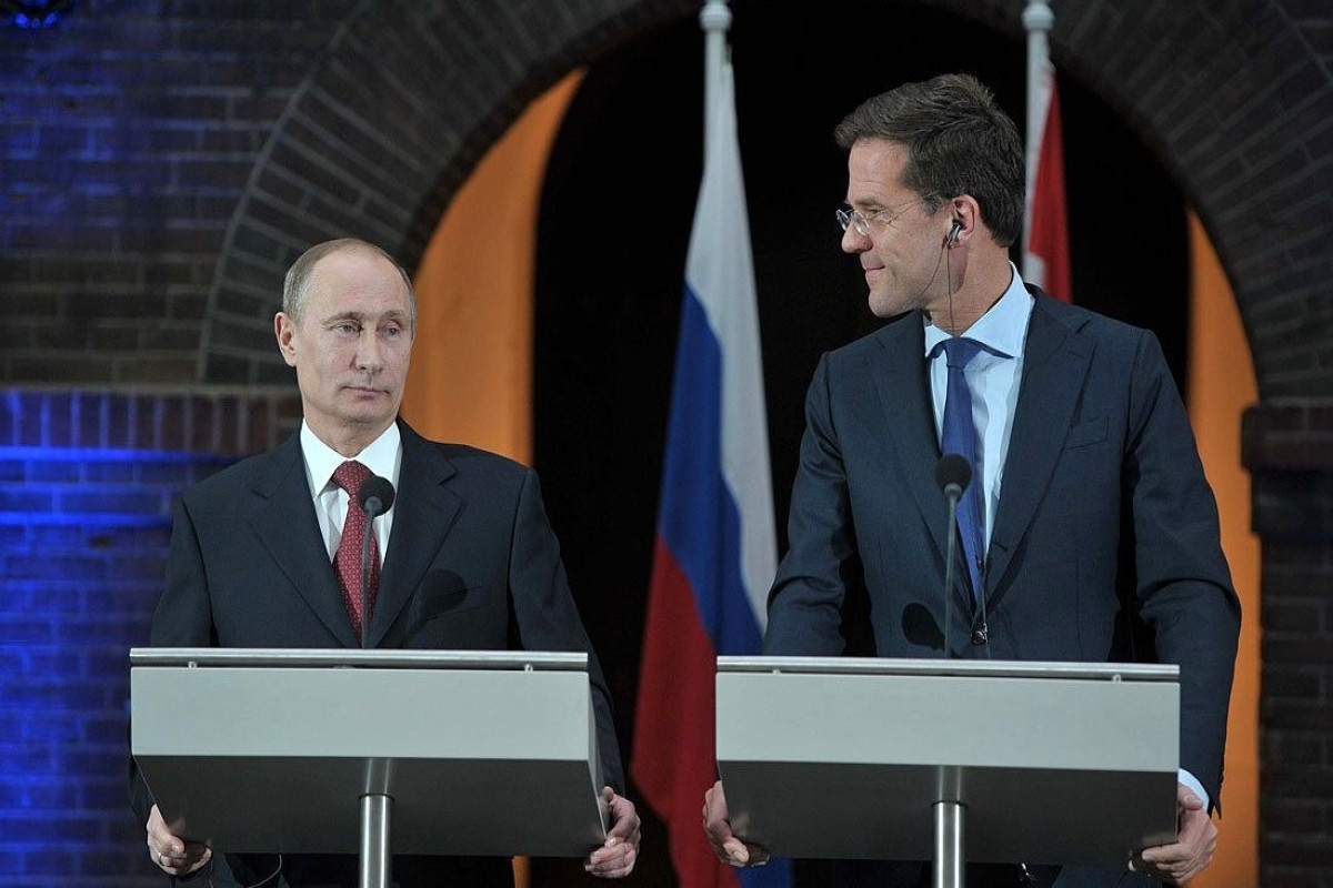 Russian President Vladimir Putin and NATO Secretary-General Mark Rutte