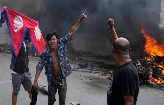 Soldiers guard Nepal's parliament, patrol streets after two days of deadly protests