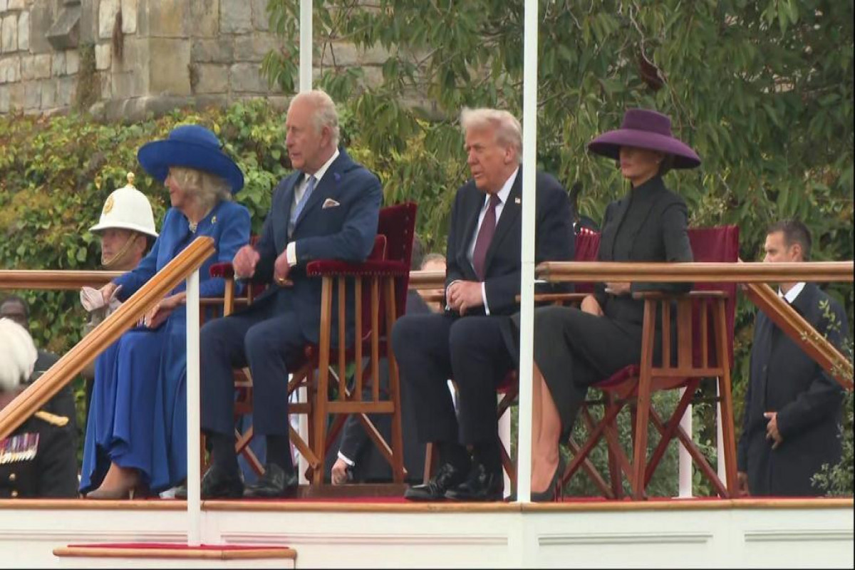 Trump and royals watch military ceremony in Windsor ahead of Red Arrows flypast