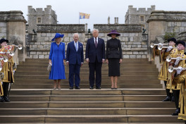 Trump and royals watch military ceremony in Windsor ahead of Red Arrows flypast