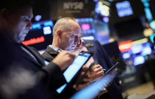 U.S. stocks close mixed after Fed cuts interest rate 