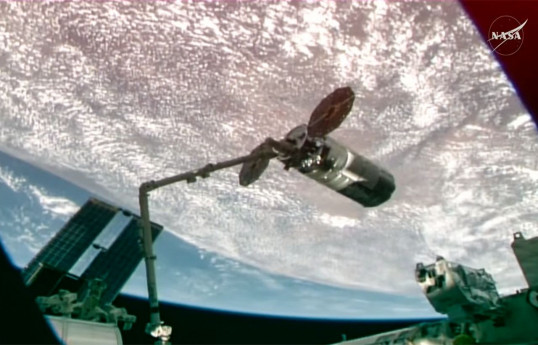 U.S. resupply spacecraft docks with space station