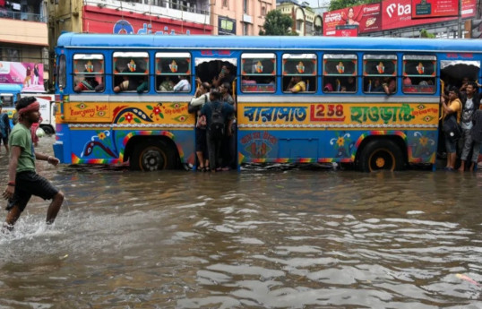 At least 10 dead after eastern Indian city and its suburbs receive heaviest rainfall in nearly 40 years