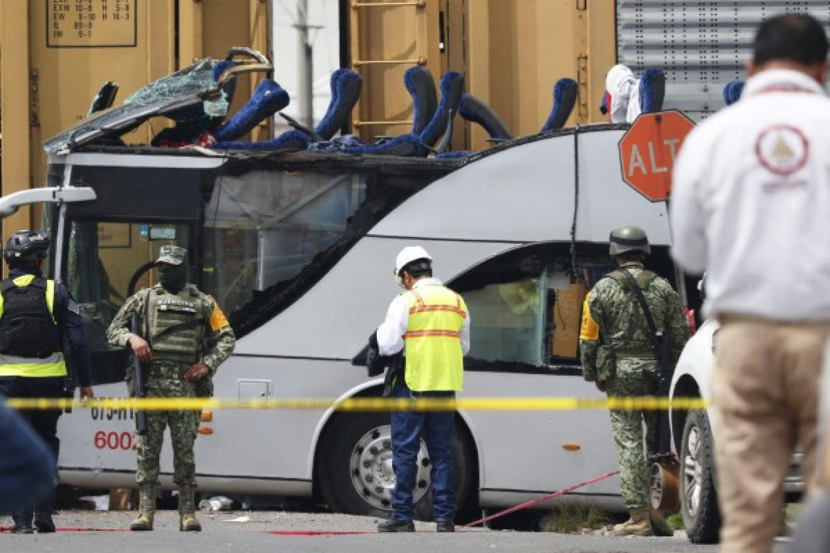 At least 5 dead in train-bus collision in central Mexico
