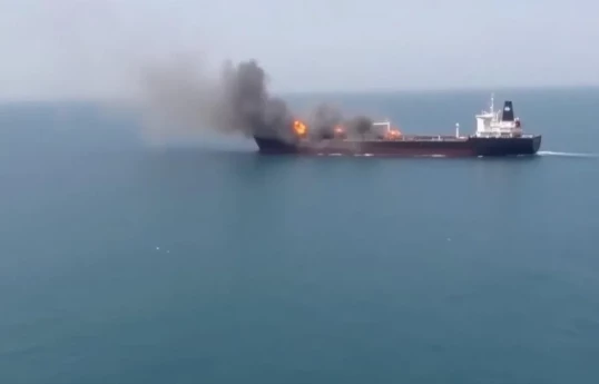 Iran Guards say they targeted an Israel-linked ship in Strait of Hormuz