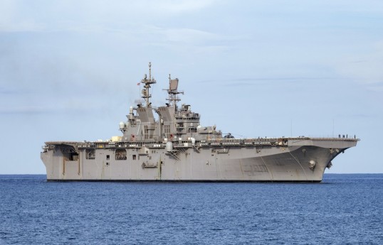 US denies Iran’s claim it struck USS Tripoli carrying 3,500 on board