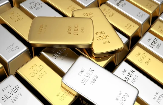 Gold declines, silver rises in commodity markets