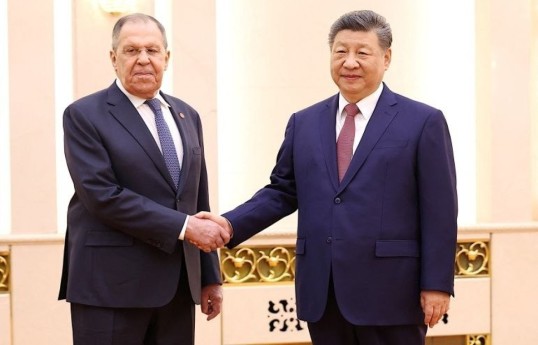 Russian Foreign Minister Sergey Lavrov and Xi Jinping, President of the People's Republic of China