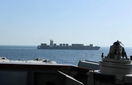 Cargo ship leaving Iran said to come under fire amid US blockade