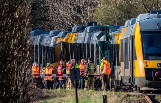 Two trains collide in Denmark, injuring 17 people, emergency service says